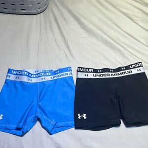 Two pairs of underarmour tight fit athletic shorts